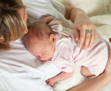 Mom holding newborn